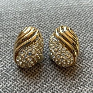 Ciner domed, gold-toned clip-on earring with pavé rhinestones